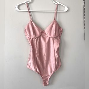 Pink silk body suit